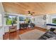 Bright office with wood floors, built-in window seat, and wood ceiling at 608 Armada S Rd, Venice, FL 34285