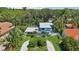 Bird's eye view of a house with a circular driveway at 608 Armada S Rd, Venice, FL 34285
