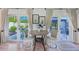 Bright breakfast nook with French doors opening to a patio at 608 Armada S Rd, Venice, FL 34285