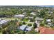 Aerial view of neighborhood with lush greenery at 608 Armada S Rd, Venice, FL 34285