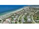 Coastal community aerial view, showing beach, ocean, and residential area at 608 Armada S Rd, Venice, FL 34285