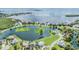 Aerial of waterfront homes and a tranquil lake at 2118 Harbour Watch Dr, Tarpon Springs, FL 34689