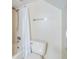 Simple bathroom with shower, toilet, and white curtain at 2118 Harbour Watch Dr, Tarpon Springs, FL 34689