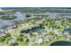 Aerial view of waterfront community with houses and canals at 2118 Harbour Watch Dr, Tarpon Springs, FL 34689