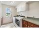 Laundry room with washer, dryer, cabinets, and countertop at 2118 Harbour Watch Dr, Tarpon Springs, FL 34689