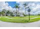 Two-story house with a large front yard and driveway at 2118 Harbour Watch Dr, Tarpon Springs, FL 34689