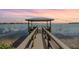 Private waterfront dock with gazebo for peaceful relaxation at 2118 Harbour Watch Dr, Tarpon Springs, FL 34689