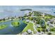 Exclusive waterfront community showcasing a beautiful lake and luxury homes at 2118 Harbour Watch Dr, Tarpon Springs, FL 34689