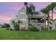 Stunning waterfront home with multi-level deck and gorgeous sunset views at 2118 Harbour Watch Dr, Tarpon Springs, FL 34689