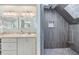 Modern bathroom with walk-in shower and updated fixtures at 2118 Harbour Watch Dr, Tarpon Springs, FL 34689