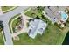 Bird's-eye view of home showcasing metal roof and landscaping at 2118 Harbour Watch Dr, Tarpon Springs, FL 34689