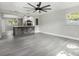 Living area with kitchen island and ceiling fan at 811 27Th Street E Ct, Bradenton, FL 34208