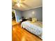 Bedroom with double bed and light wood flooring at 1313 E New Orleans Ave, Tampa, FL 33603