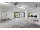 Expansive unfinished basement space with sliding glass doors to the outdoors. Ideal for customization and storage at 321 W Hanlon St, Tampa, FL 33604