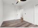 Bright bedroom featuring wood floors, ceiling fan and white trim at 321 W Hanlon St, Tampa, FL 33604