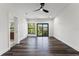 Large bedroom with wood floors and walkout balcony at 321 W Hanlon St, Tampa, FL 33604