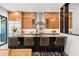 Modern kitchen with wood cabinets, large island, and stainless steel appliances at 321 W Hanlon St, Tampa, FL 33604