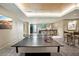 Well equipped game room with ping pong table and bar at 450 Knights Run Ave # 411, Tampa, FL 33602