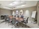Modern conference room boasts a large table and comfortable seating for multiple attendees at 450 Knights Run Ave # 411, Tampa, FL 33602