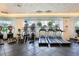 Fitness center featuring treadmills and elliptical machines at 450 Knights Run Ave # 411, Tampa, FL 33602