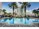 Beautiful pool area with palm trees and an elegant design, offering a luxurious and relaxing outdoor space at 700 S Harbour Island Blvd # 722, Tampa, FL 33602