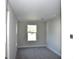 Clean bedroom with large windows and neutral carpeting at 759 48Th N Ave, St Petersburg, FL 33703