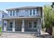 Charming new construction home featuring a covered front porch and large windows at 759 48Th N Ave, St Petersburg, FL 33703