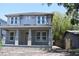 Charming new construction home featuring a covered front porch and large windows at 759 48Th N Ave, St Petersburg, FL 33703