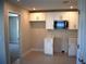 Compact kitchen with modern appliances and ample storage space at 759 48Th N Ave, St Petersburg, FL 33703