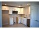 Well-equipped kitchen with stainless steel appliances and white cabinetry at 759 48Th N Ave, St Petersburg, FL 33703