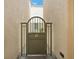Private gated entry to condo unit at 450 Knights Run Ave # 411, Tampa, FL 33602