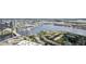Aerial view showcasing the community's waterfront location and proximity to the city skyline at 450 Knights Run Ave # 411, Tampa, FL 33602