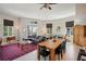 Open concept living and dining area with hardwood floors at 450 Knights Run Ave # 411, Tampa, FL 33602