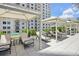 Relaxing pool deck with shaded lounge chairs at 450 Knights Run Ave # 411, Tampa, FL 33602