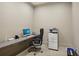 Business center with computer, printer, and office chair at 450 Knights Run Ave # 411, Tampa, FL 33602