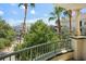 Balcony view of lush trees and city buildings at 450 Knights Run Ave # 411, Tampa, FL 33602