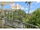 Partial view of a park-like setting from a balcony at 450 Knights Run Ave # 411, Tampa, FL 33602