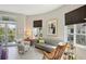 Comfortable living room with hardwood floors and a sitting area at 450 Knights Run Ave # 411, Tampa, FL 33602
