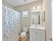 Bathroom with shower/tub combo and single vanity at 11432 Drifting Leaf Dr, Riverview, FL 33579