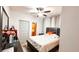 Comfortable bedroom with a queen bed and dark accents at 2503 W Marquette Ave, Tampa, FL 33614