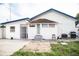 House exterior with backyard, patio, and shed at 2503 W Marquette Ave, Tampa, FL 33614
