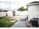 Backyard with shed, patio, and grassy area at 2503 W Marquette Ave, Tampa, FL 33614