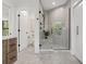 Spa-like bathroom with a large walk-in shower and modern fixtures at 321 W Hanlon St, Tampa, FL 33604