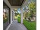 Covered patio with lounge chairs and serene water views at 321 W Hanlon St, Tampa, FL 33604