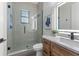 Modern bathroom with a glass shower, marble vanity, and stylish fixtures at 321 W Hanlon St, Tampa, FL 33604