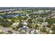 Neighborhood aerial view showcasing the lake, mature trees, mix of homes near Tampa Bay at 2206 N Boulevard, Tampa, FL 33602