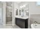 Modern bathroom featuring walk-in shower, dual vanity, and modern fixtures at 2206 N Boulevard, Tampa, FL 33602
