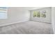 Expansive bedroom with multiple windows offering ample natural light and serene views at 2206 N Boulevard, Tampa, FL 33602