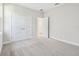 Bedroom with carpet, recessed lighting, baseboards, and a closet at 2206 N Boulevard, Tampa, FL 33602