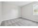 Neutral bedroom featuring carpet, baseboards, and a window at 2206 N Boulevard, Tampa, FL 33602